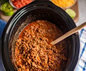 Delicious Crockpot Taco Meat in a bowl, ready for tacos or salads.
